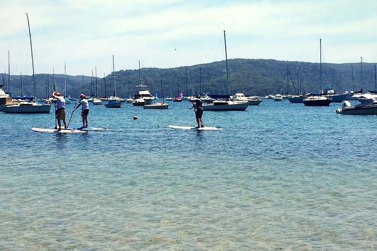 Stand-up paddling at Clareville Beach