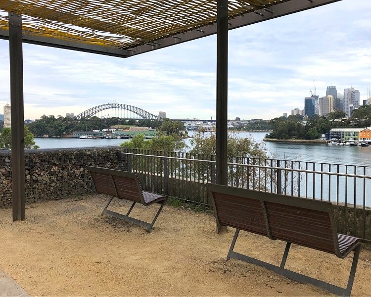 Seating area in Ballast Point Park overlooking the Harbour