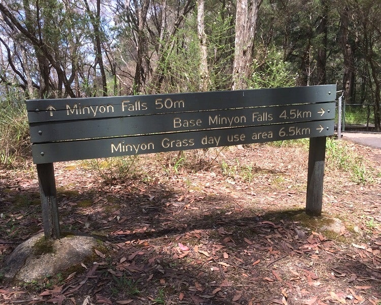 Signpost with walking tracks to Minyon Falls